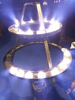 Tealight candles arranged on a stand